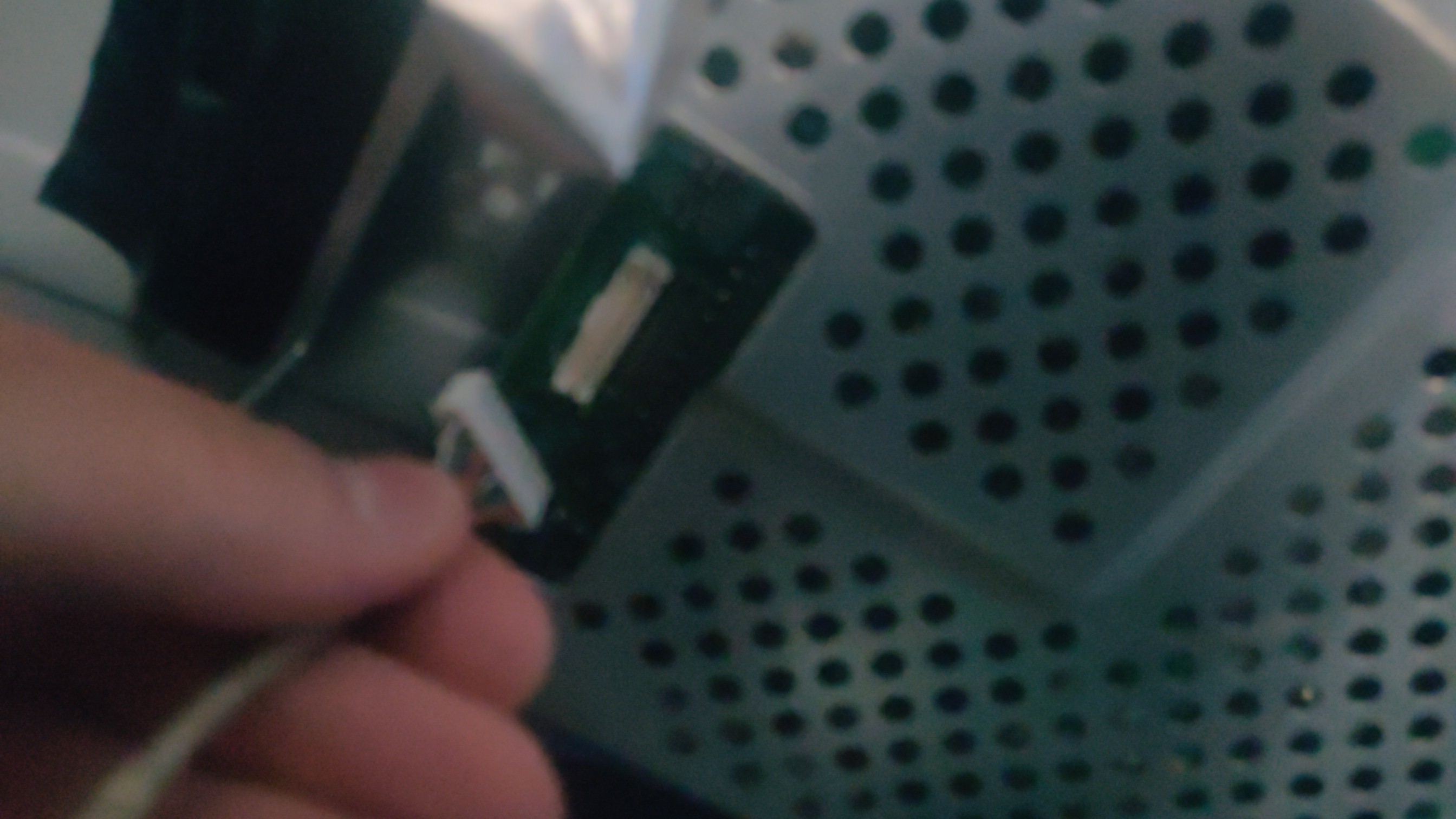 Cable that needs to be removed to fully separate the monitor