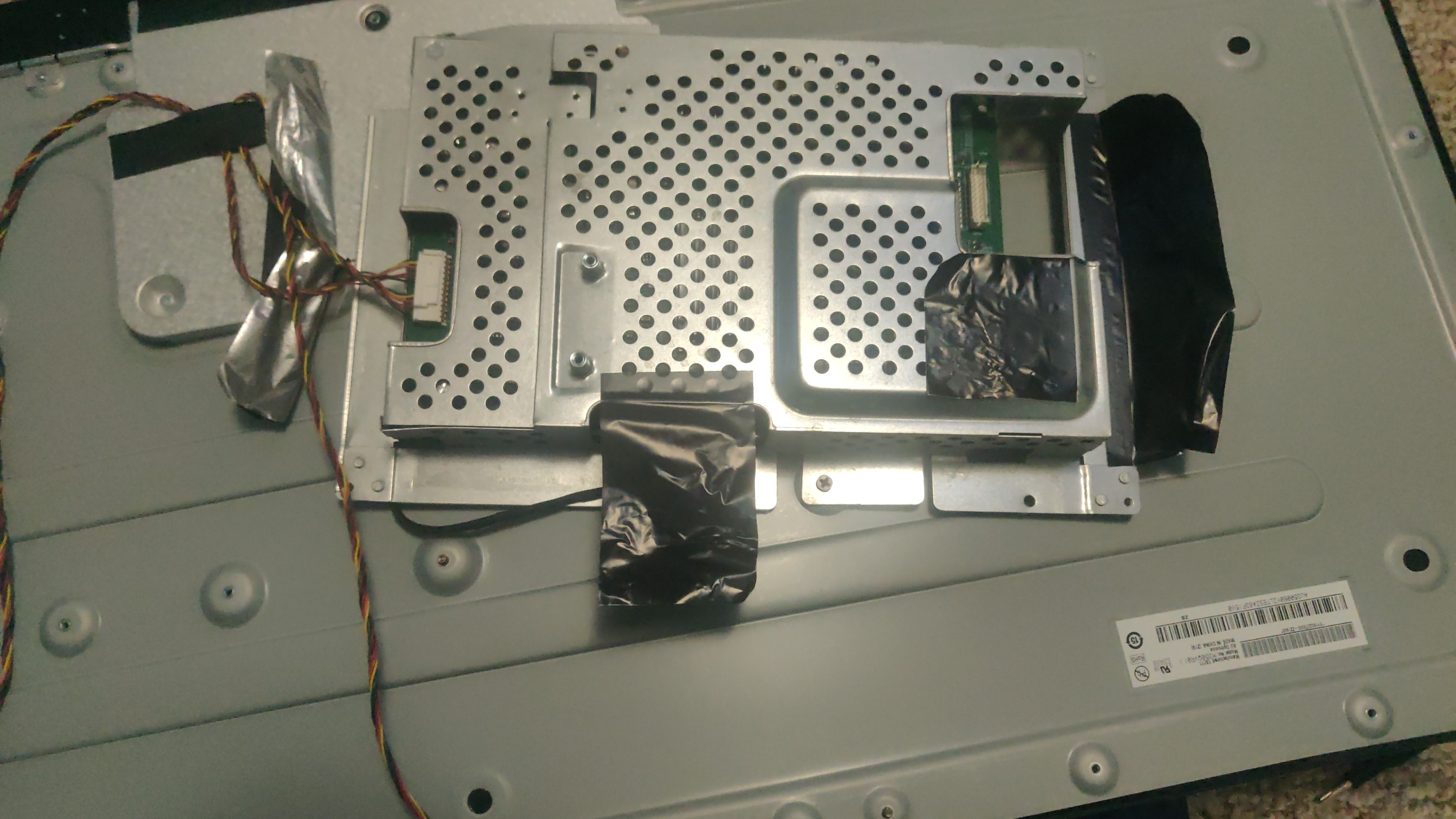 Monitor showing full back after bezel has been removed